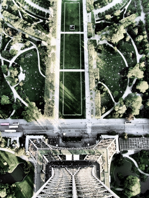 View down to the ground from the highest platform of the Eiffel Tower in Paris.