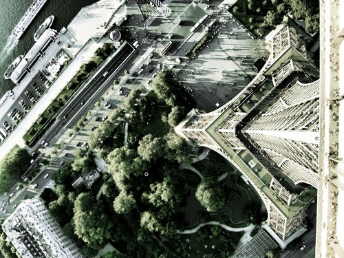 View down to the ground from the highest platform of the Eiffel Tower in Paris.