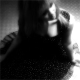 My little sister Sandra, photographed with a mobile phone's internal camera.